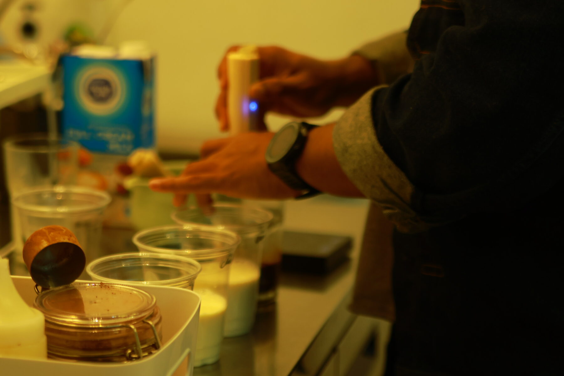 Barista pouring a drink at NOOKS