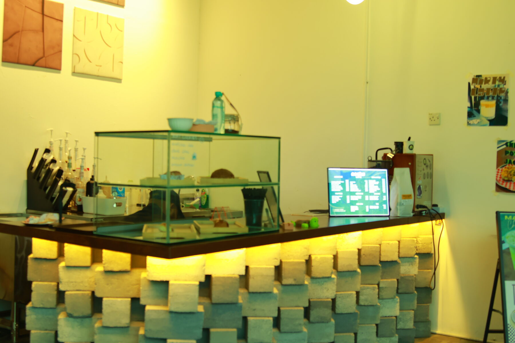 The NOOKS ordering counter and brick-lit bar