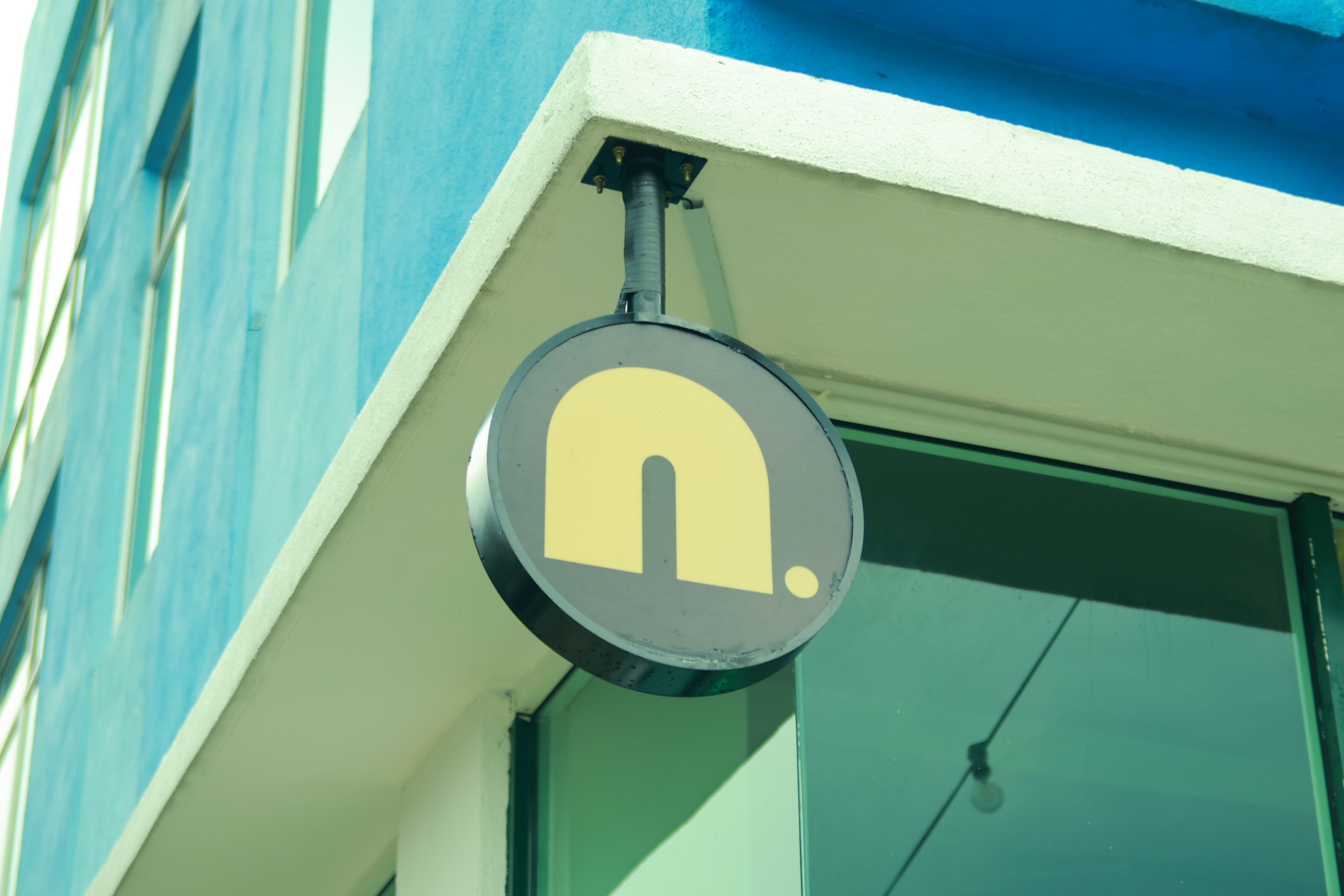 NOOKS logo sign outside the shop