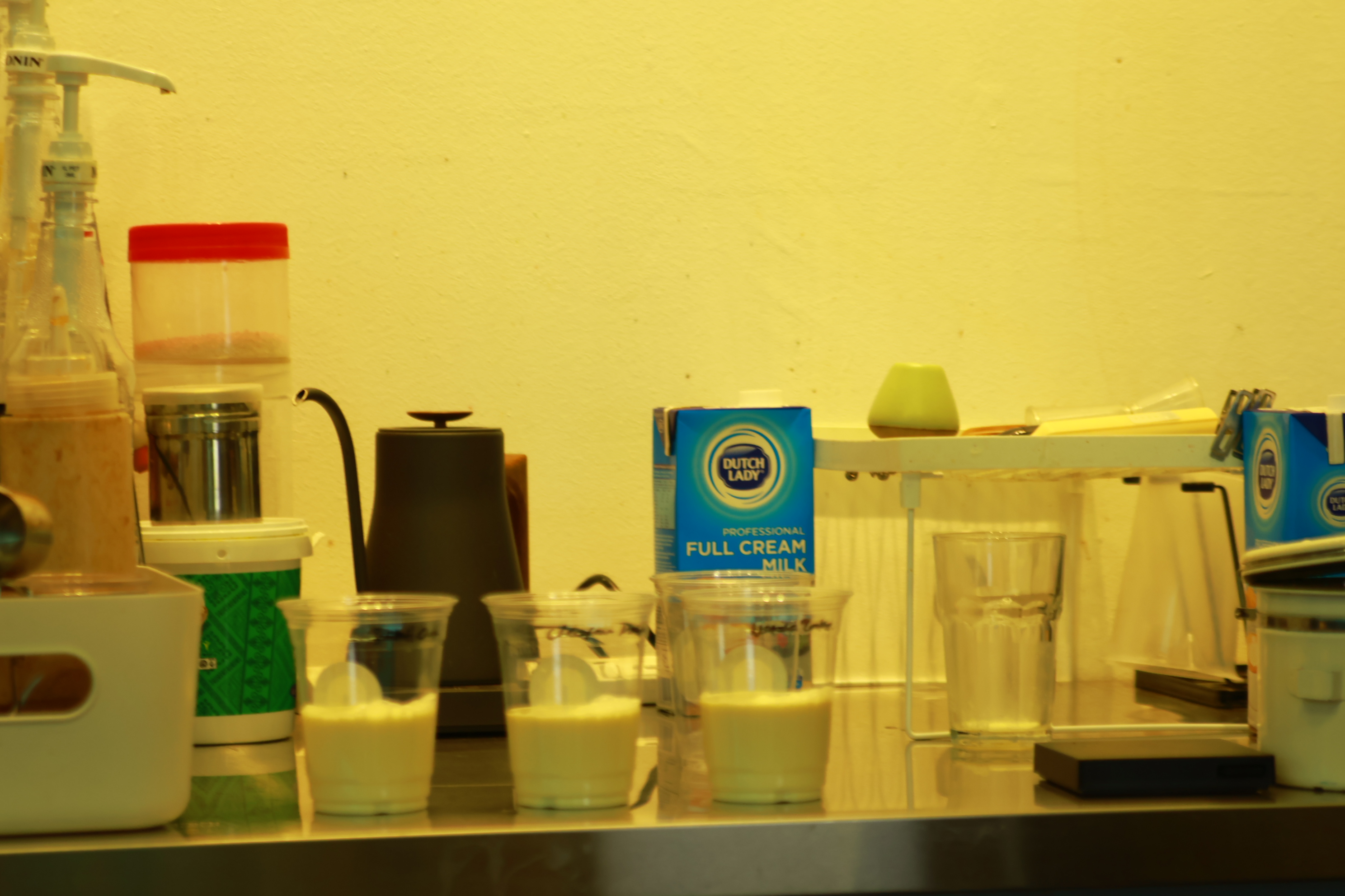 Pouring a drink at the prep counter